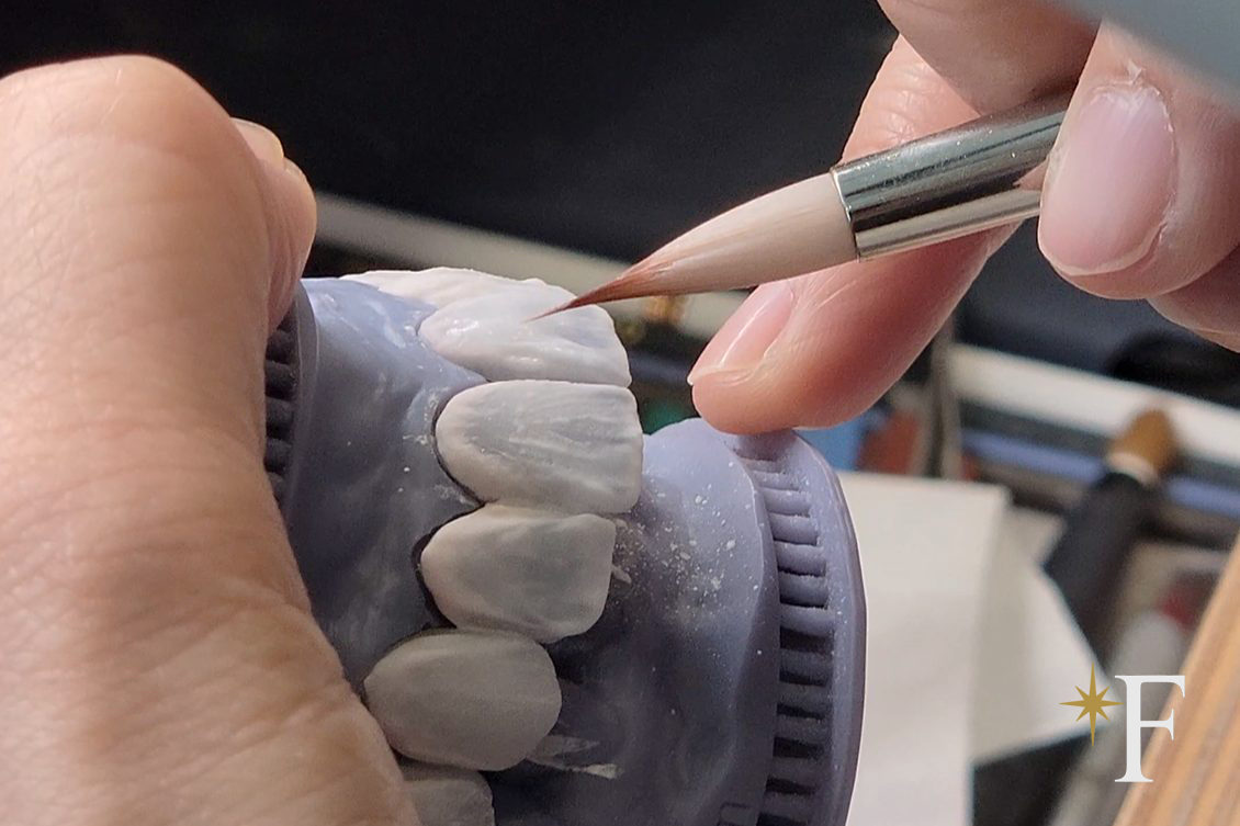 The workbench, ceramic and dental instruments in natural light