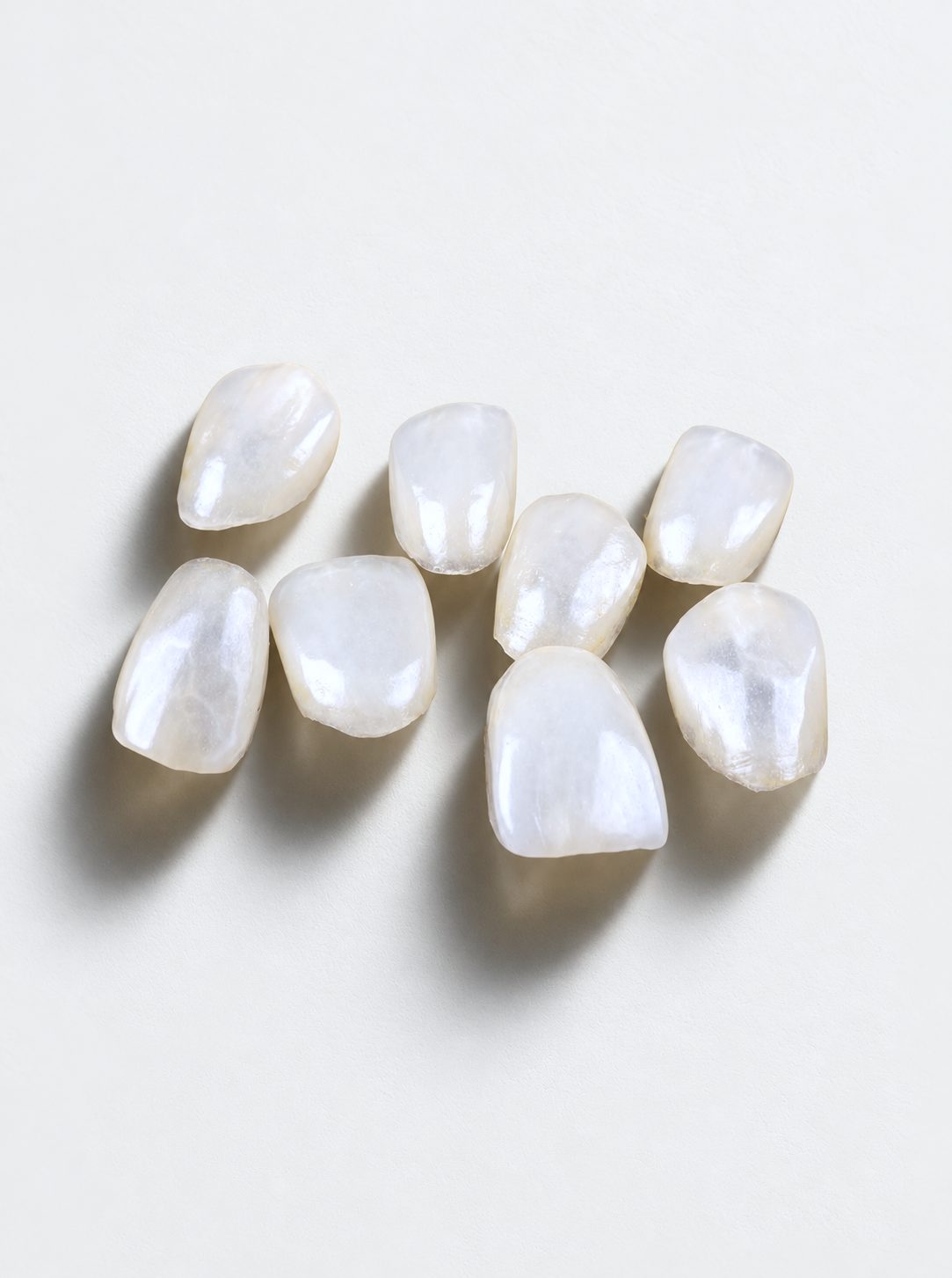 Handmade ceramic veneer in macro, translucency against the light